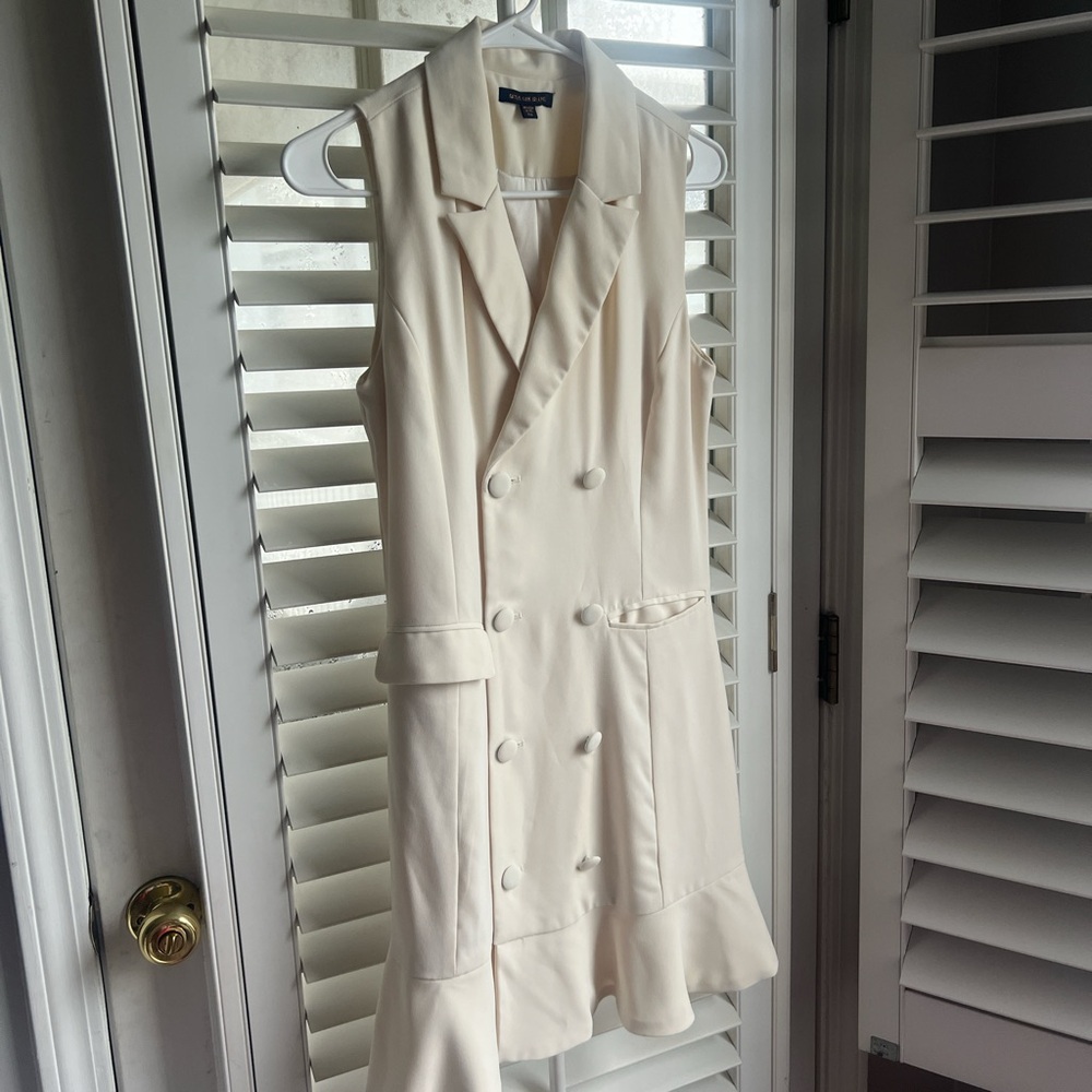 Skies Are Blue white double breasted vest dress.